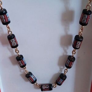 Necklace - 15 inches long No clasp Barrel like beads with a tribal aztec…